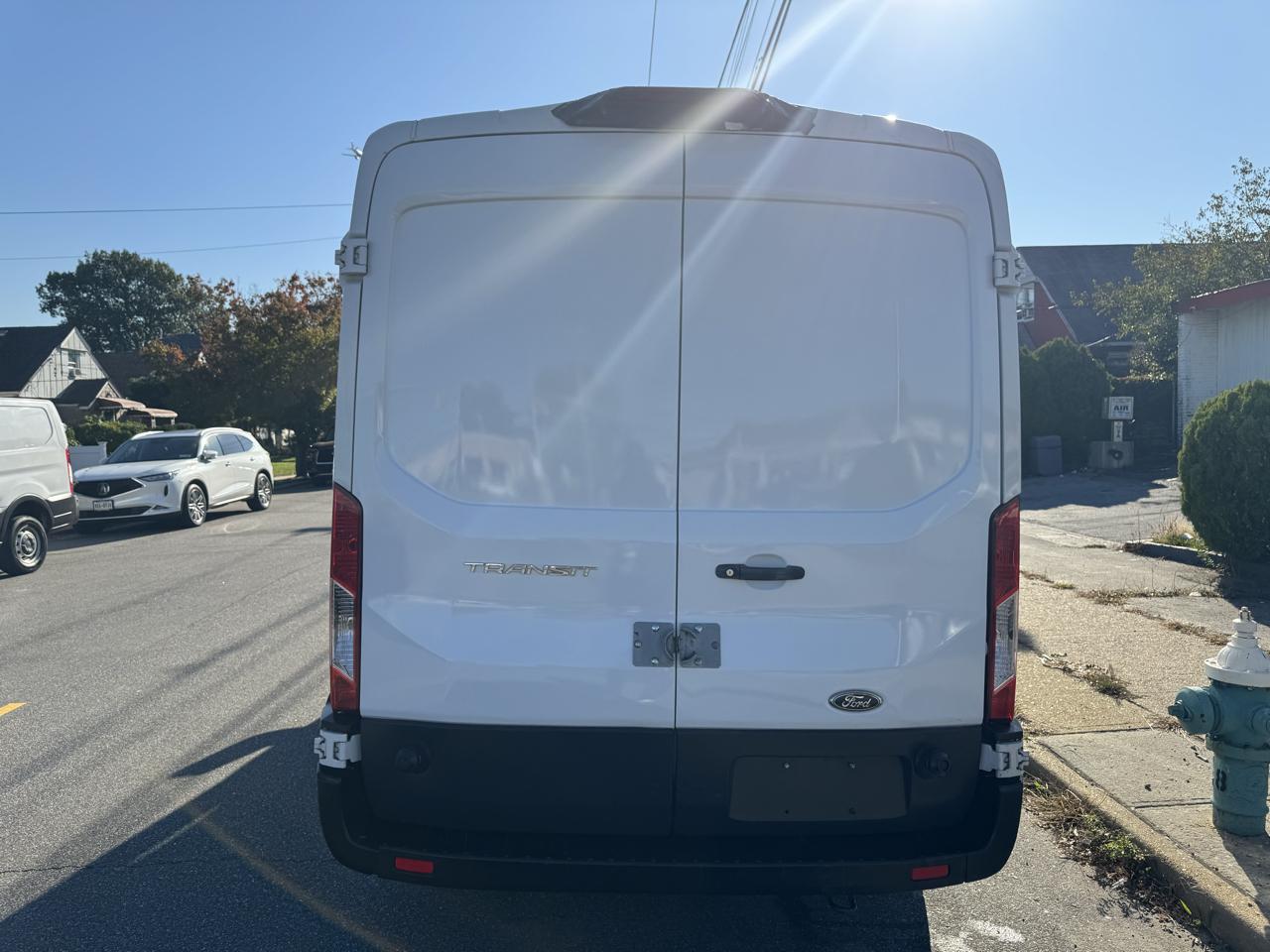 Ford Transit 150 Van Med. Roof w/Sliding Pass. 148-in. WB 2019