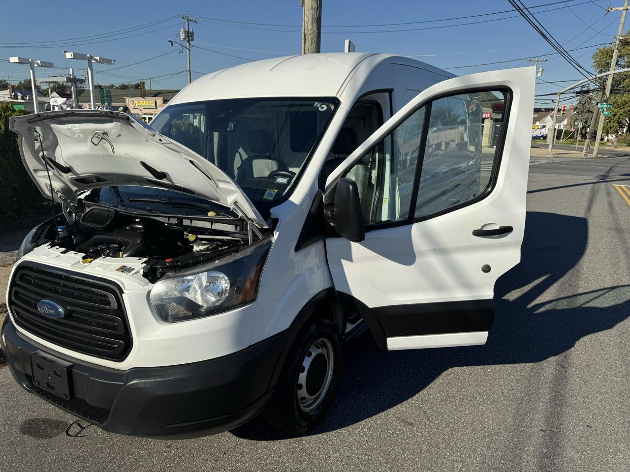 Ford Transit 150 Van Med. Roof w/Sliding Pass. 148-in. WB 2019