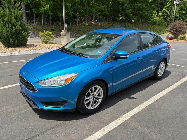 Blue 2016 Ford Focus SE Sedan Front-Wheel Drive 5-Speed Manual