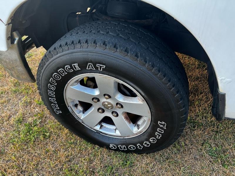 RAM 1500 4WD Crew Cab 140.5" SLT 2011