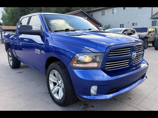 Blue 2014 RAM 1500 Pickup Truck Four-Wheel Drive Automatic