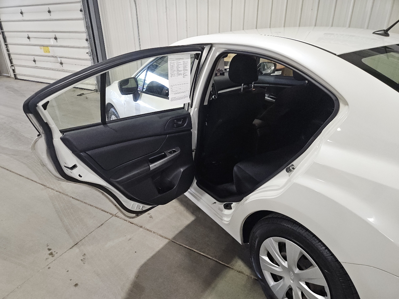 Subaru Impreza 2.0i PZEV CVT 4-Door 2015 Subaru Impreza 2.0i PZEV CVT 4-Door 2015