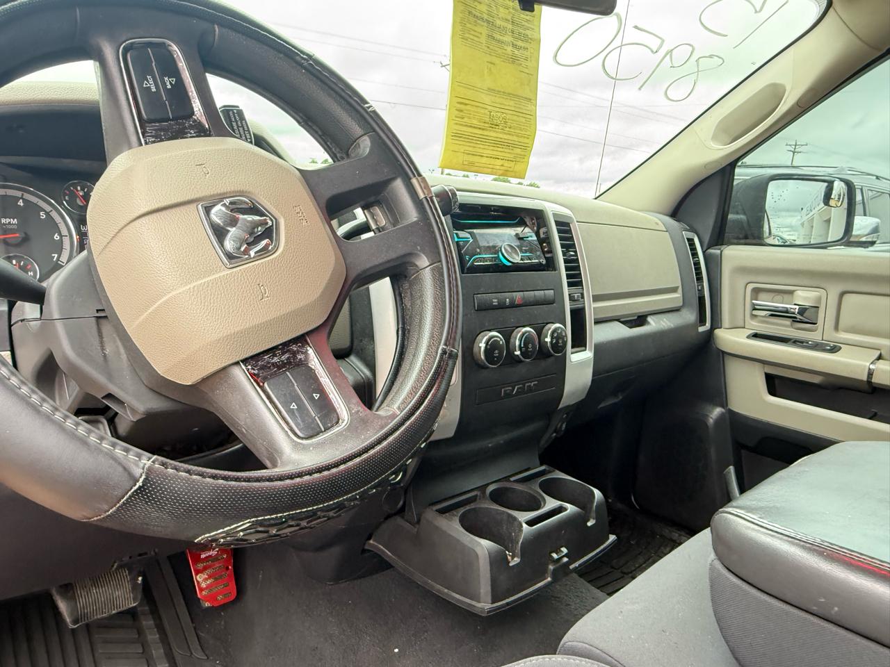 RAM 1500 4WD Quad Cab 140.5" SLT 2011