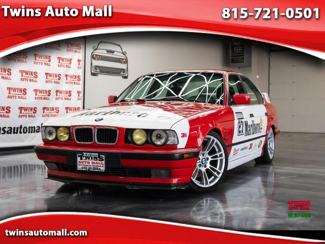 Red 1995 BMW 5 Series 525i Sedan RWD Sedan Rear-Wheel Drive Automatic