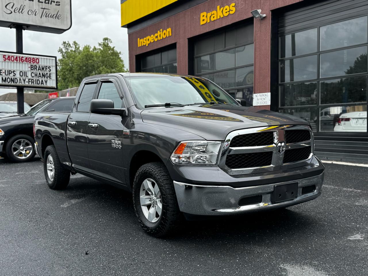 RAM 1500 4WD Quad Cab 140.5" SLT 2016