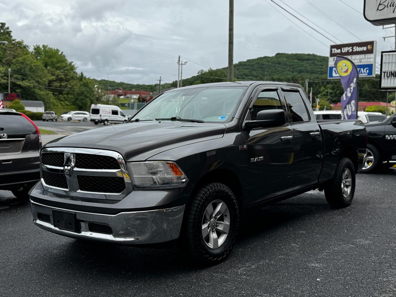 RAM 1500 4WD Quad Cab 140.5" SLT 2016