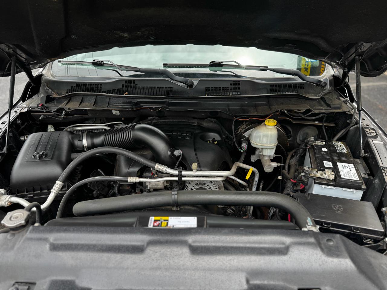 RAM 1500 4WD Quad Cab 140.5" SLT 2016