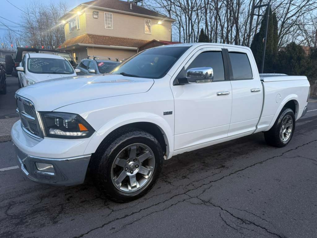 RAM 1500 4WD Quad Cab 140.5" Laramie 2012