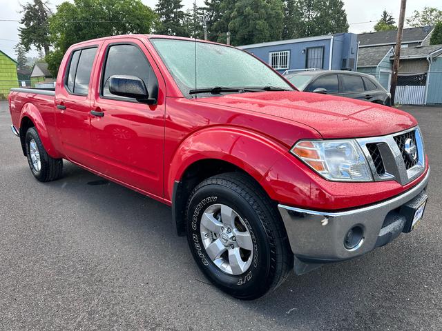 Red 2010 Nissan Frontier LE Crew Cab LWB 4WD Pickup Truck Four-Wheel Drive Automatic