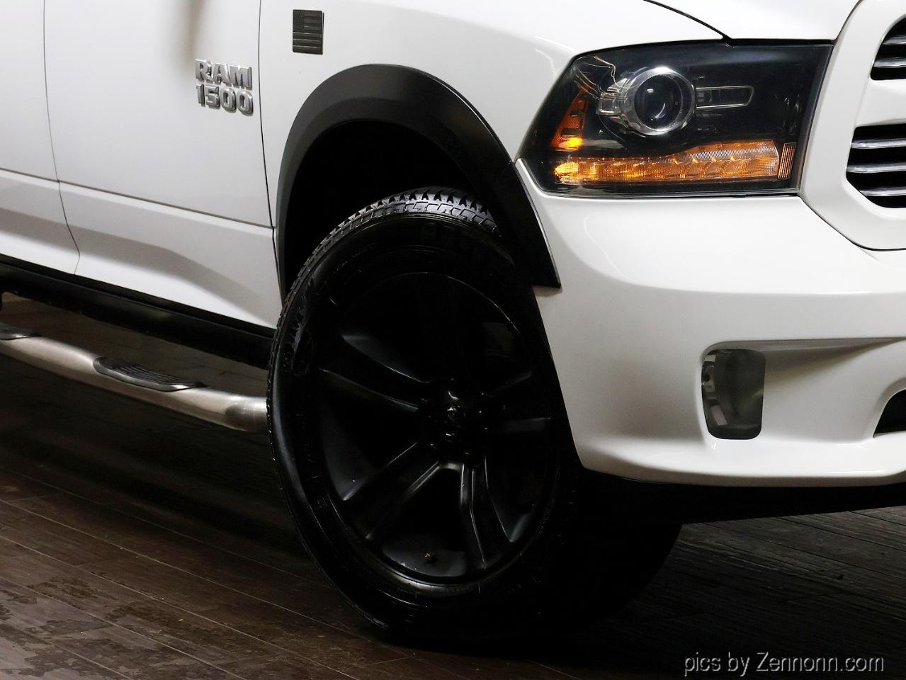 RAM 1500 4WD Crew Cab 140.5" Sport 2014