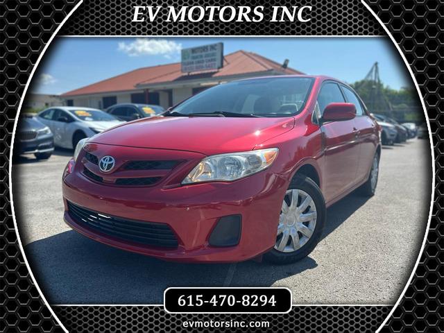 Red 2011 Toyota Corolla LE Sedan Front-Wheel Drive