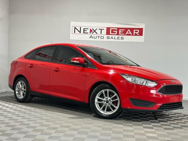 Red 2015 Ford Focus SE Sedan Front-Wheel Drive Automatic