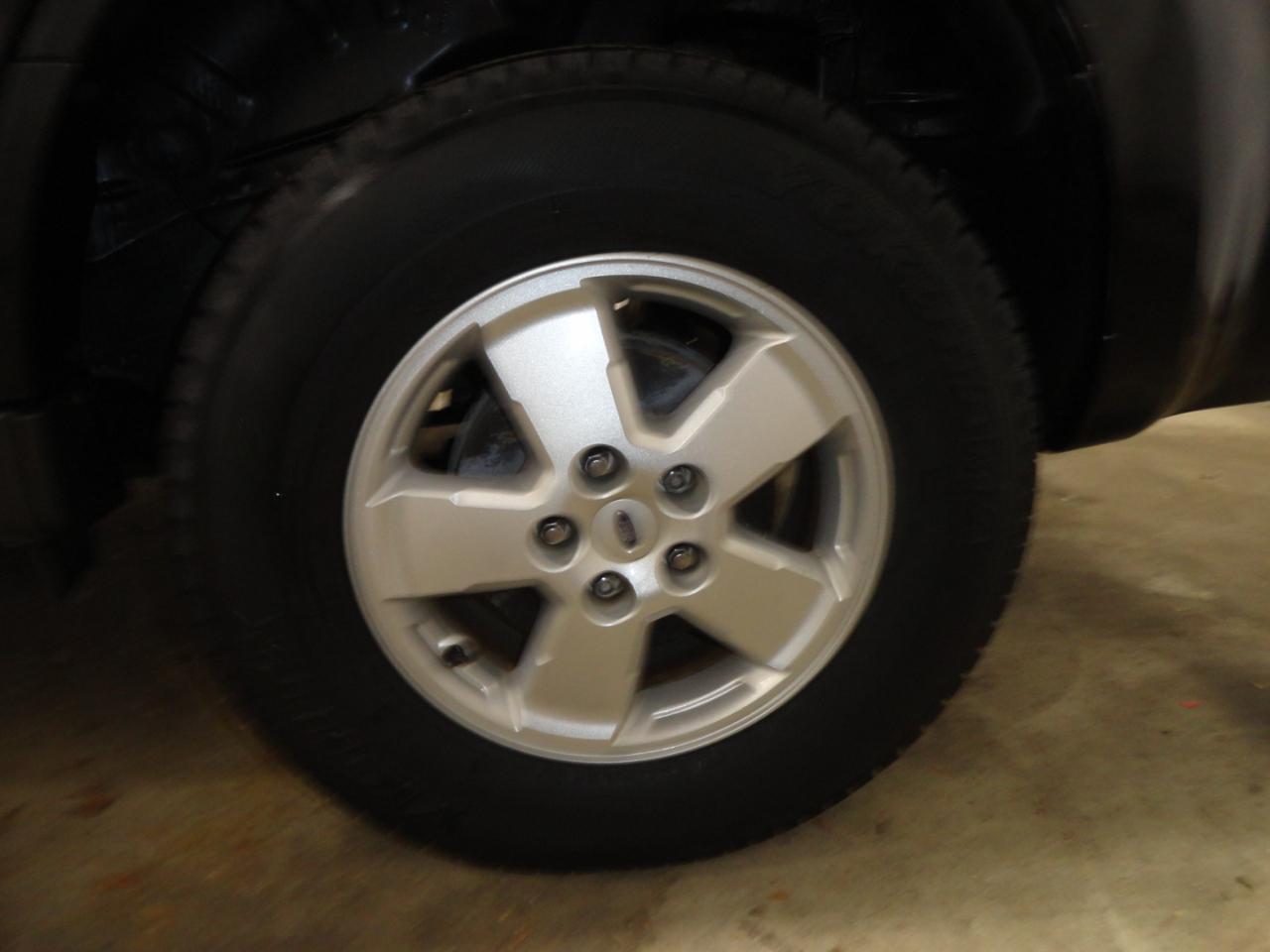 Ford Escape FWD 4dr XLT 2010