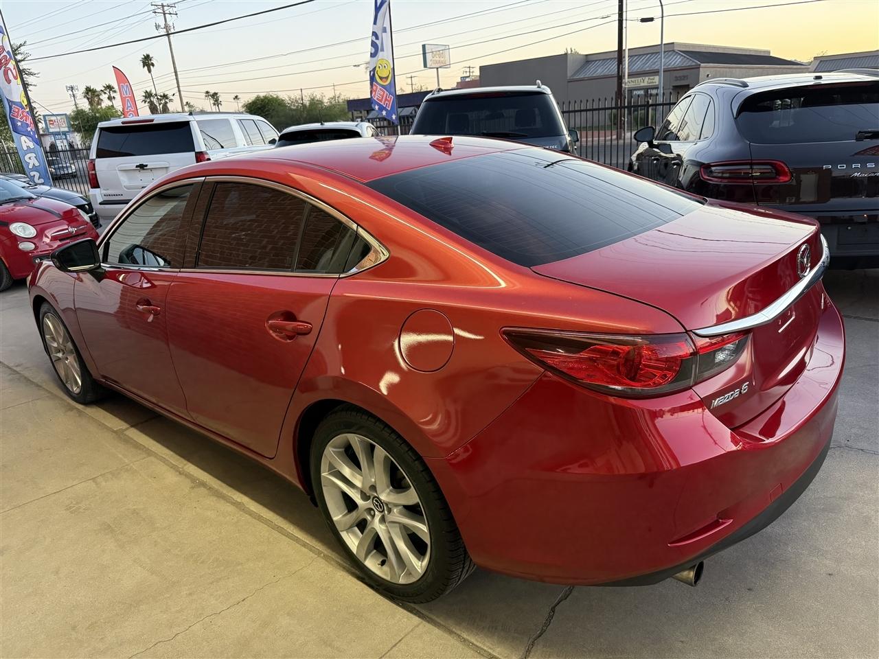2015 Mazda EZ-6 i Touring Auto's photo