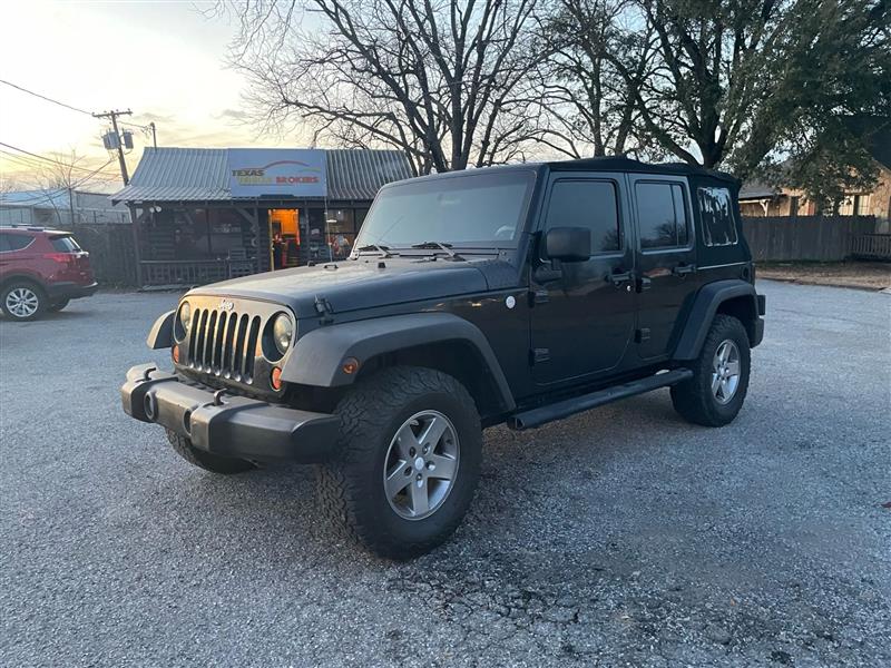 Used 2010 Jeep Wrangler Unlimited Rubicon with VIN 1J4HA6H19AL215418 for sale in Sherman, TX