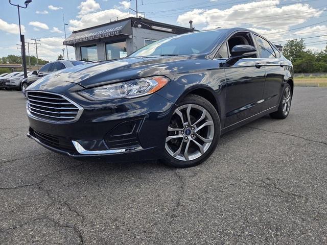 Blue 2020 Ford Fusion Sedan Front-Wheel Drive Automatic