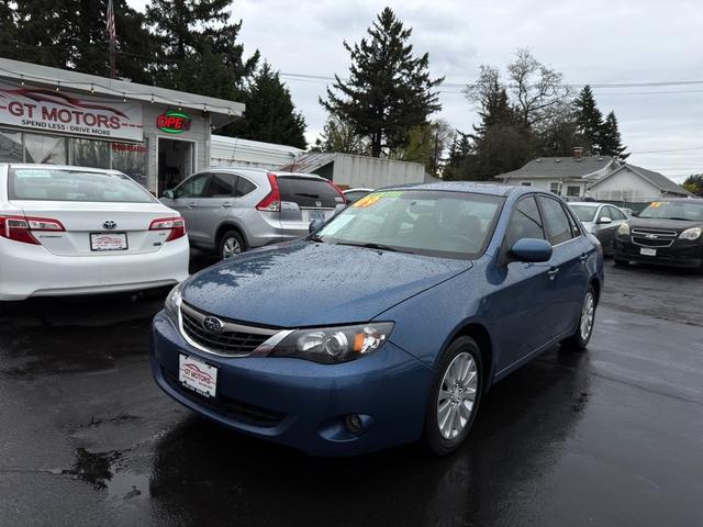 Blue 2009 Subaru Impreza 2.5i Premium Sedan All-Wheel Drive Automatic