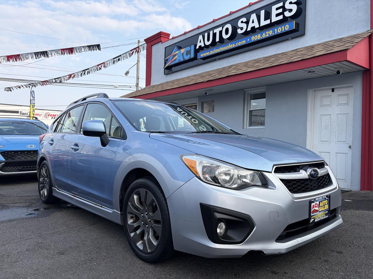 Blue 2012 Subaru Impreza Hatchback All-Wheel Drive Automatic