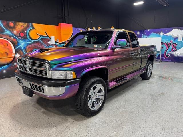 Purple 1997 Dodge RAM 1500 Pickup Truck Four-Wheel Drive Automatic