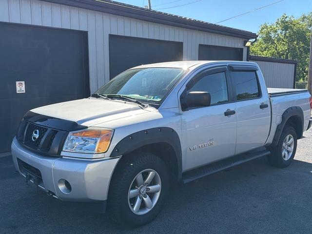 brilliant silver 2015 Nissan Titan S Crew Cab 4WD Pickup Truck Four-Wheel Drive Automatic