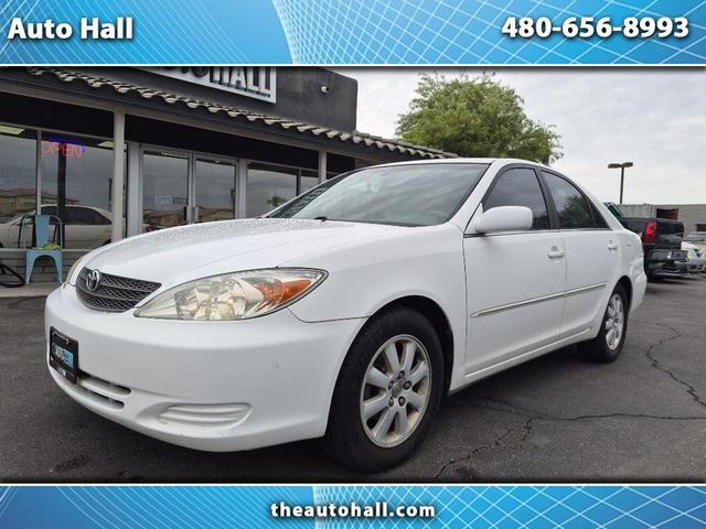 White 2002 Toyota Camry Sedan Front-Wheel Drive Automatic