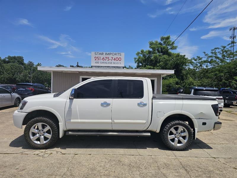 2011 Nissan Titan SL 4X4 Crew Cab SWB's photo