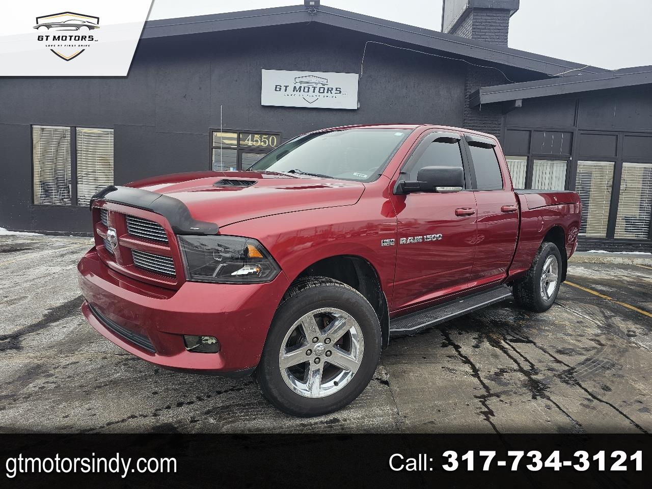 2012 RAM 1500 4WD Quad Cab 140.5" Sport