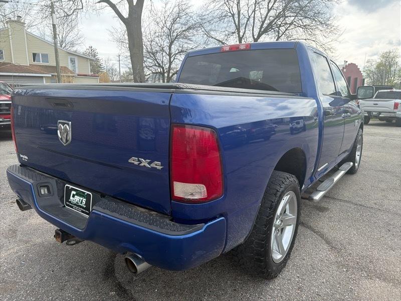 RAM 1500 4WD Crew Cab 140.5" Sport 2014