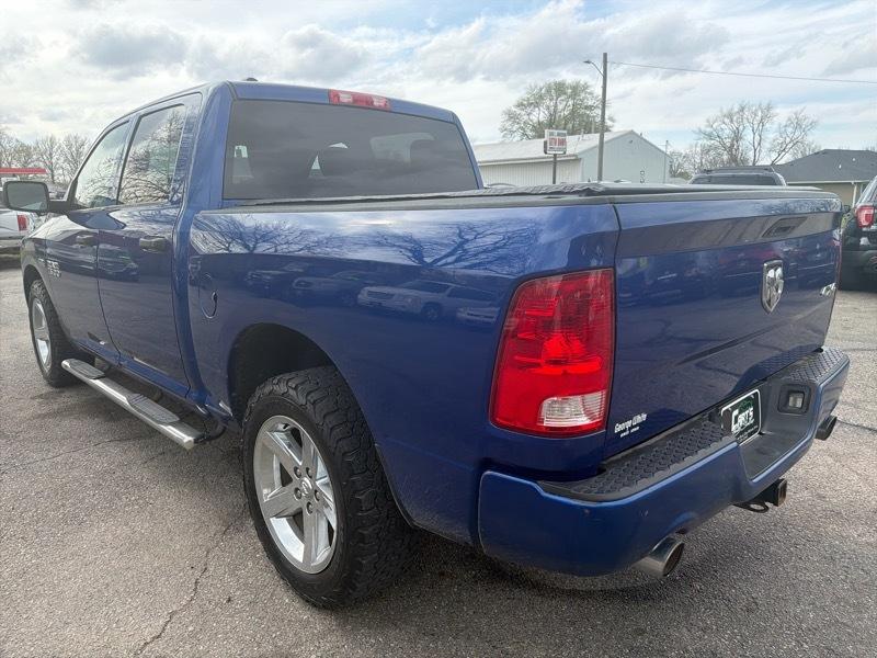 RAM 1500 4WD Crew Cab 140.5" Sport 2014