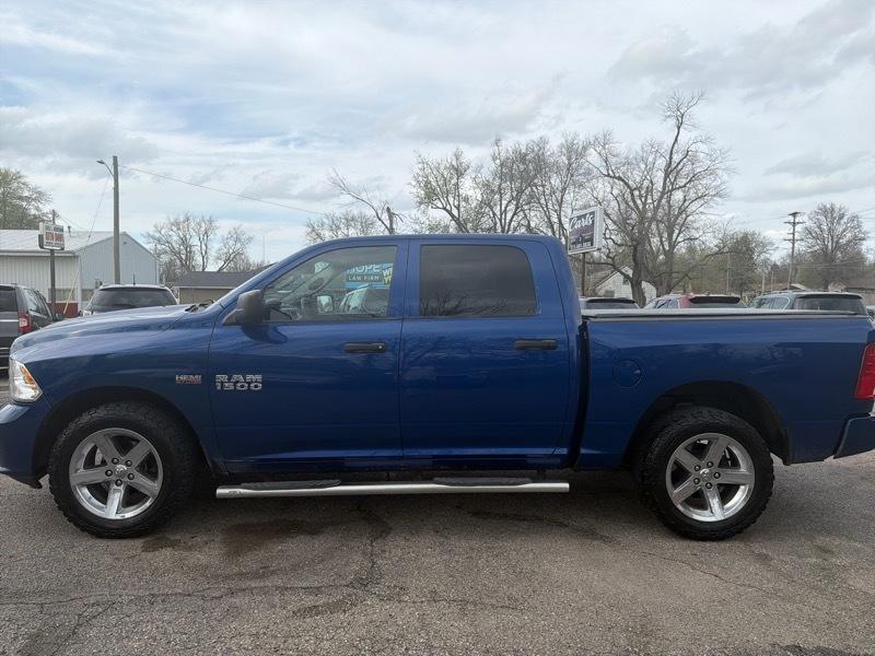 RAM 1500 4WD Crew Cab 140.5" Sport 2014