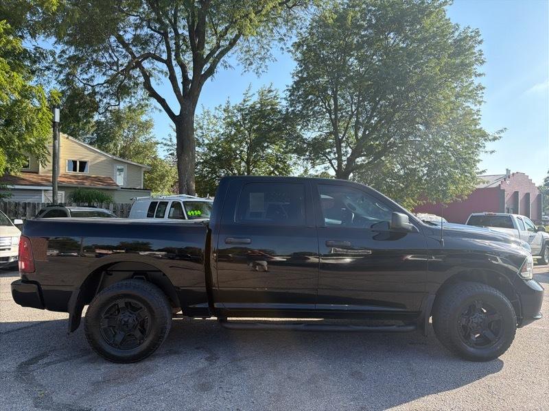 RAM 1500 4WD Crew Cab 140.5" Sport 2014