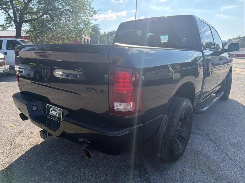 RAM 1500 4WD Crew Cab 140.5" Sport 2014