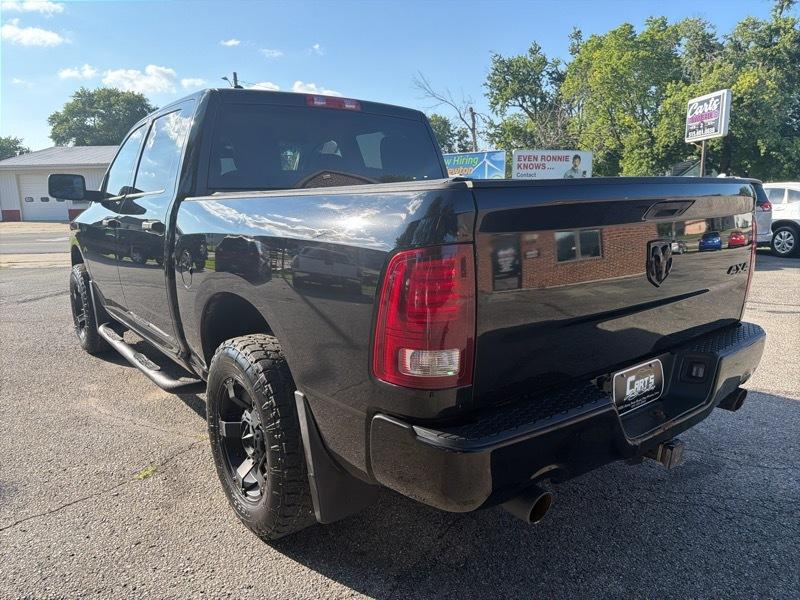 RAM 1500 4WD Crew Cab 140.5" Sport 2014