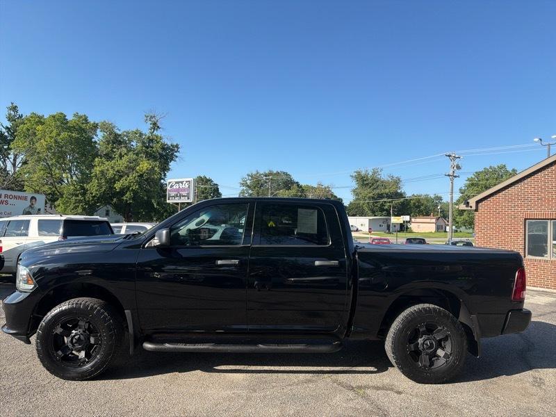 RAM 1500 4WD Crew Cab 140.5" Sport 2014
