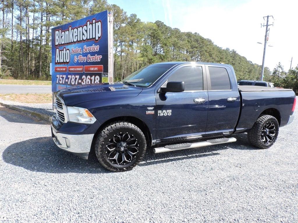 RAM 1500 4WD Quad Cab 140.5" Outdoorsman 2014