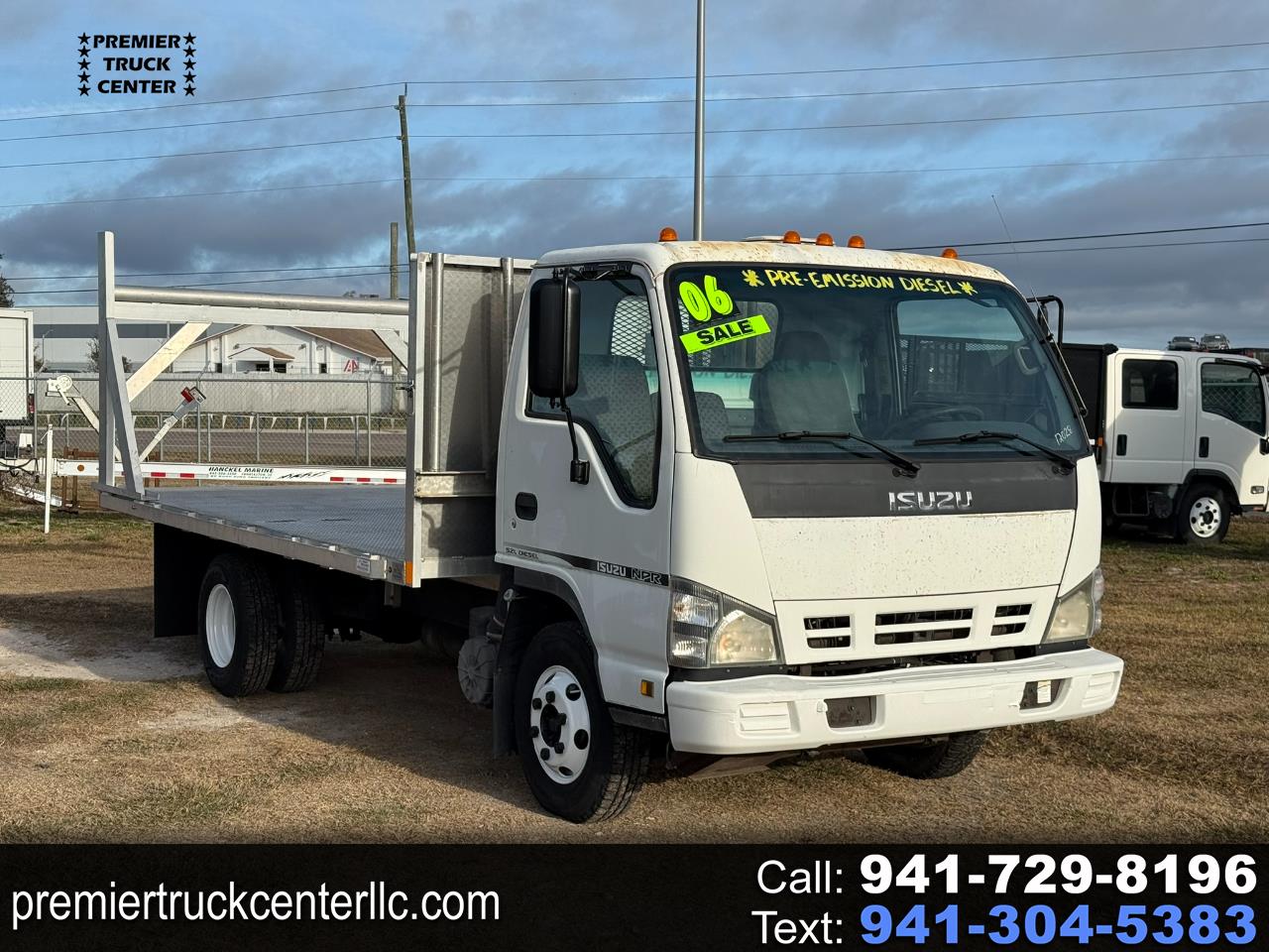 2006 Isuzu NPR 14' Aluminum Flatbed with Tree Bar *PRE-EMISSION*