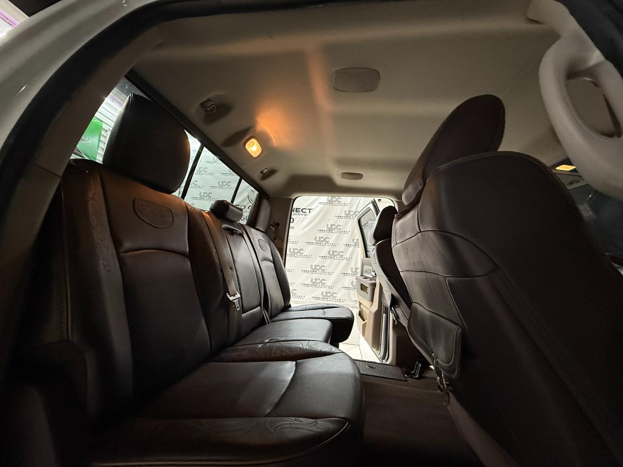 RAM 1500 4WD Crew Cab 140.5" Laramie Longhorn Edition 2012