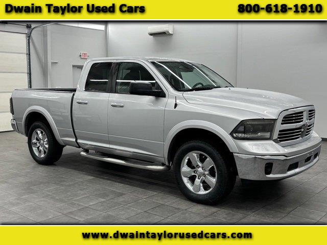 2015 RAM 1500 4WD Quad Cab 140.5" Big Horn
