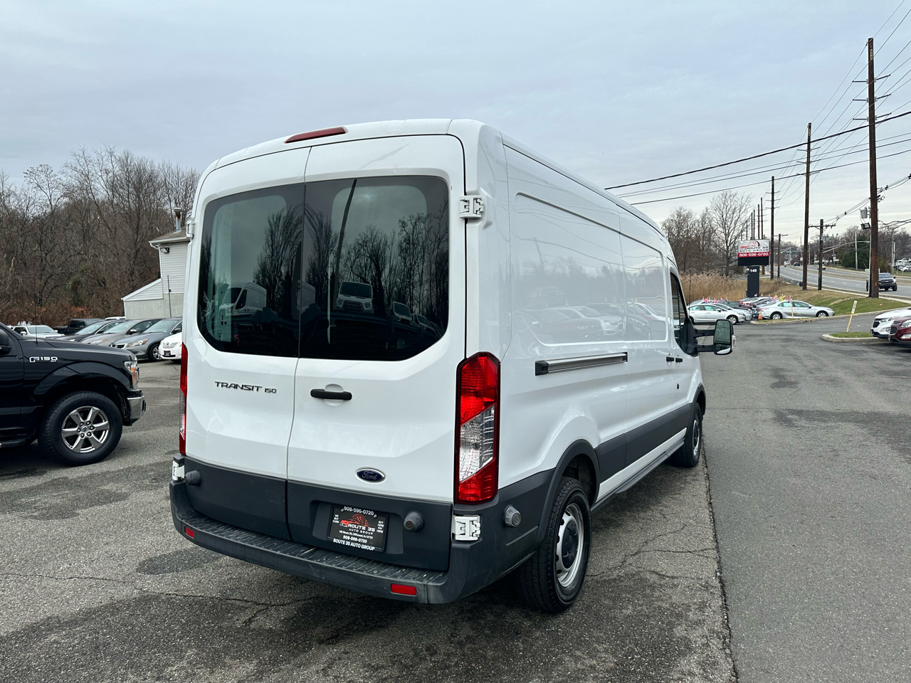 Ford Transit 150 Van Med. Roof w/Dual Sliding 148-in. WB 2015