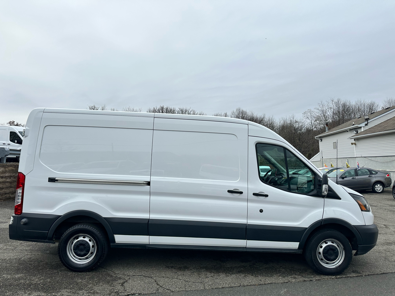 Ford Transit 150 Van Med. Roof w/Dual Sliding 148-in. WB 2015