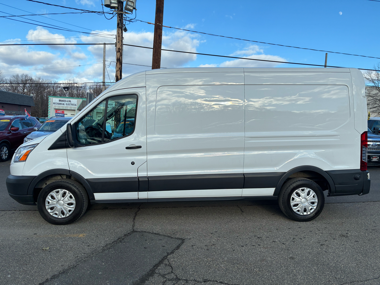 Ford Transit 250 Van Med. Roof w/Sliding Pass. 148-in. WB 2015