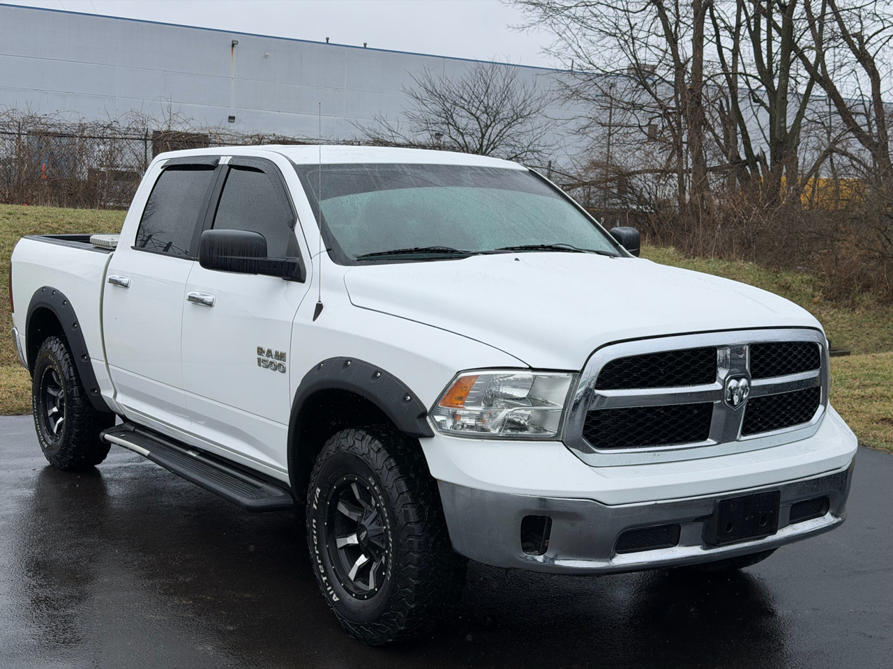 RAM 1500 4WD Crew Cab 140.5" SLT 2013