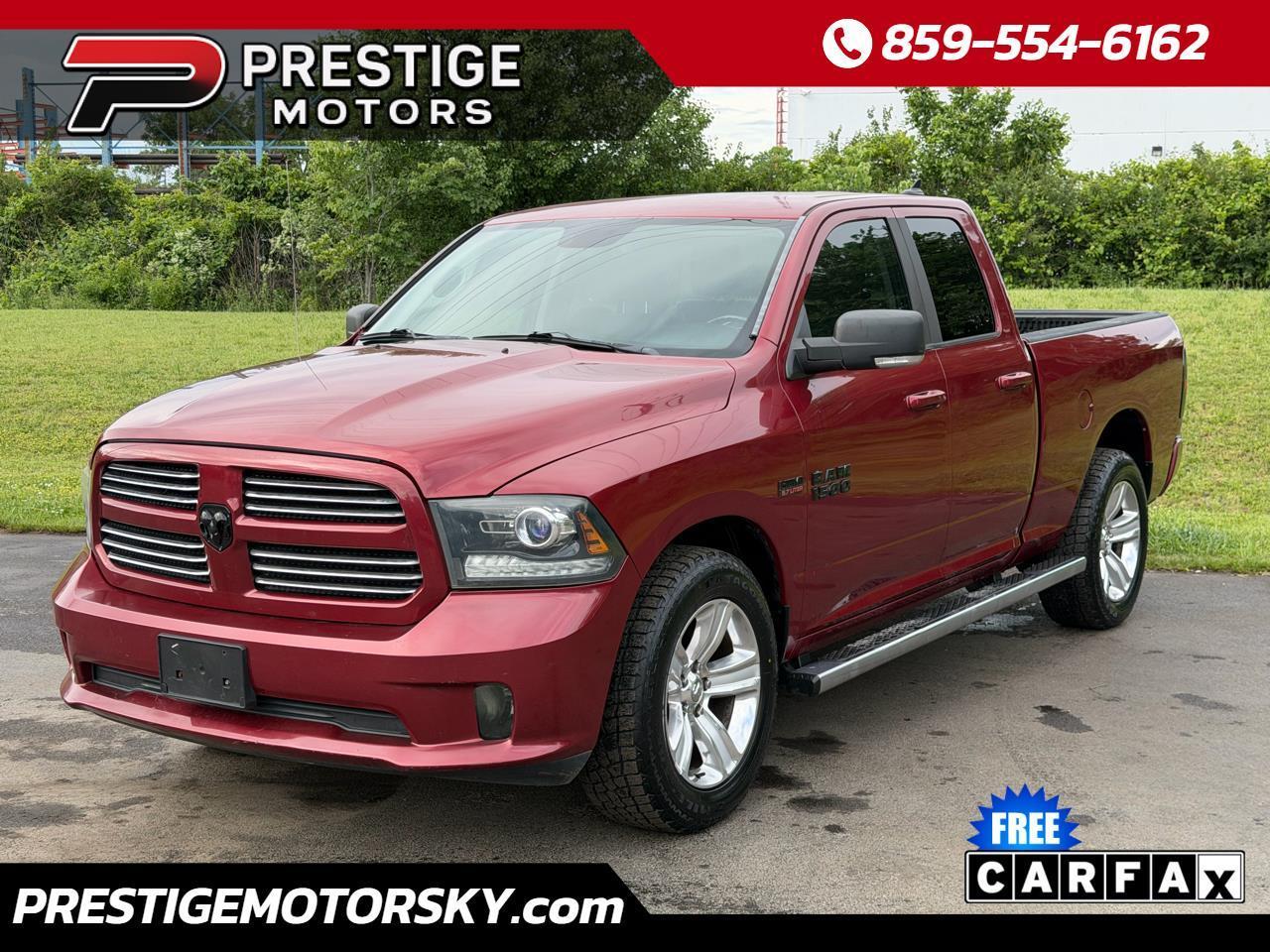 RAM 1500 4WD Quad Cab 140.5" Sport 2014