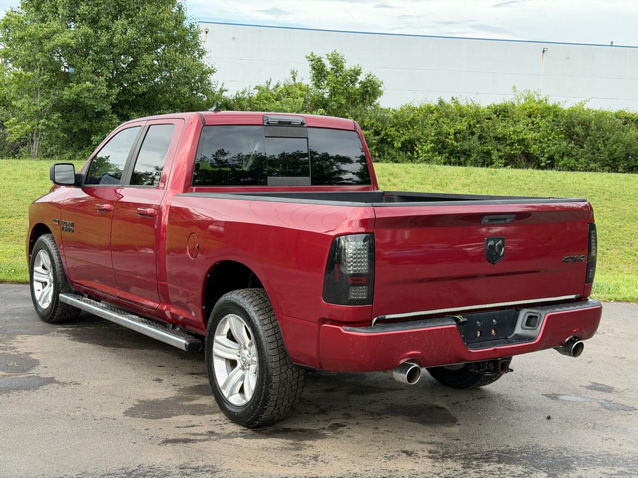 RAM 1500 4WD Quad Cab 140.5" Sport 2014