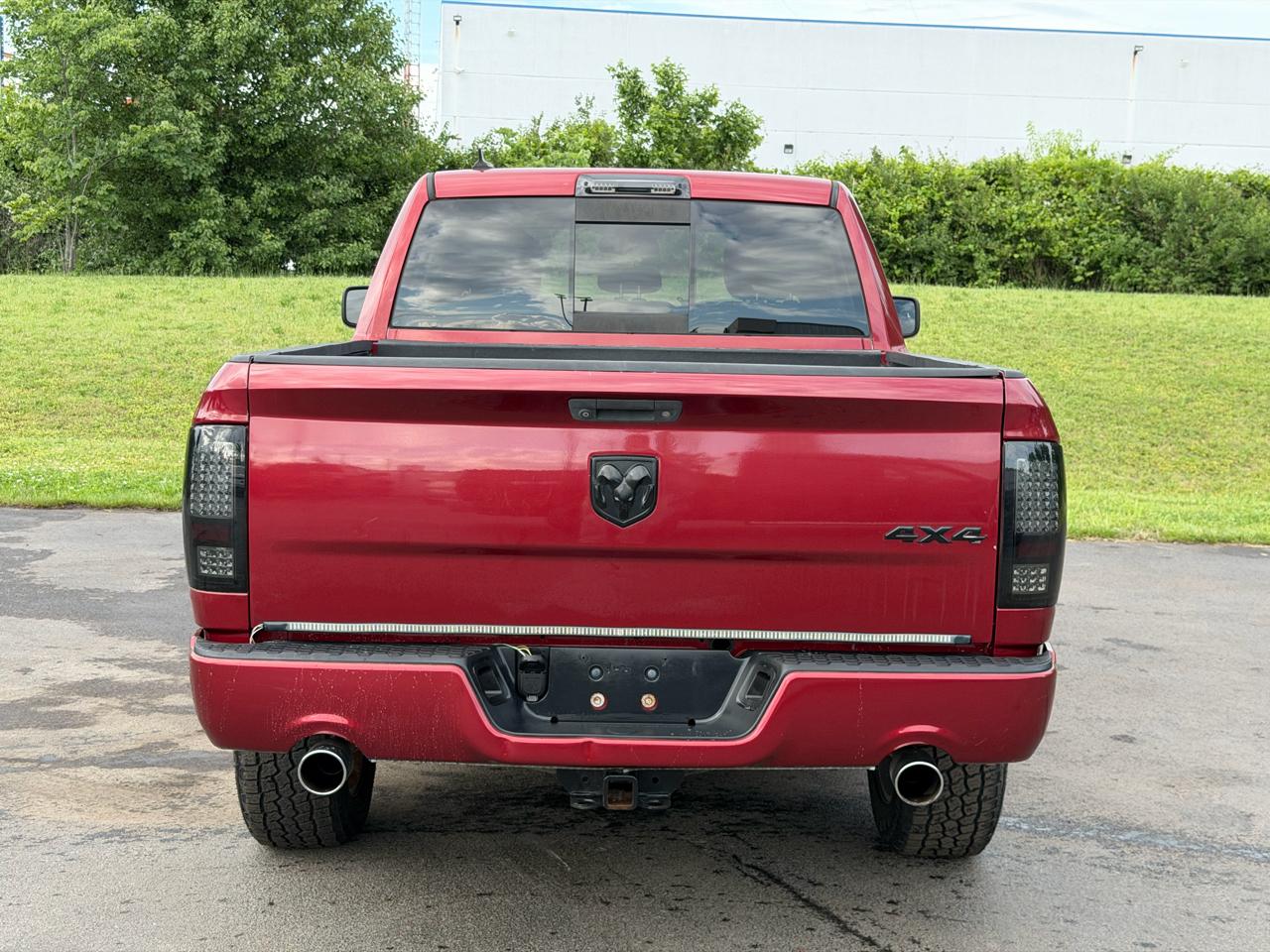 RAM 1500 4WD Quad Cab 140.5" Sport 2014