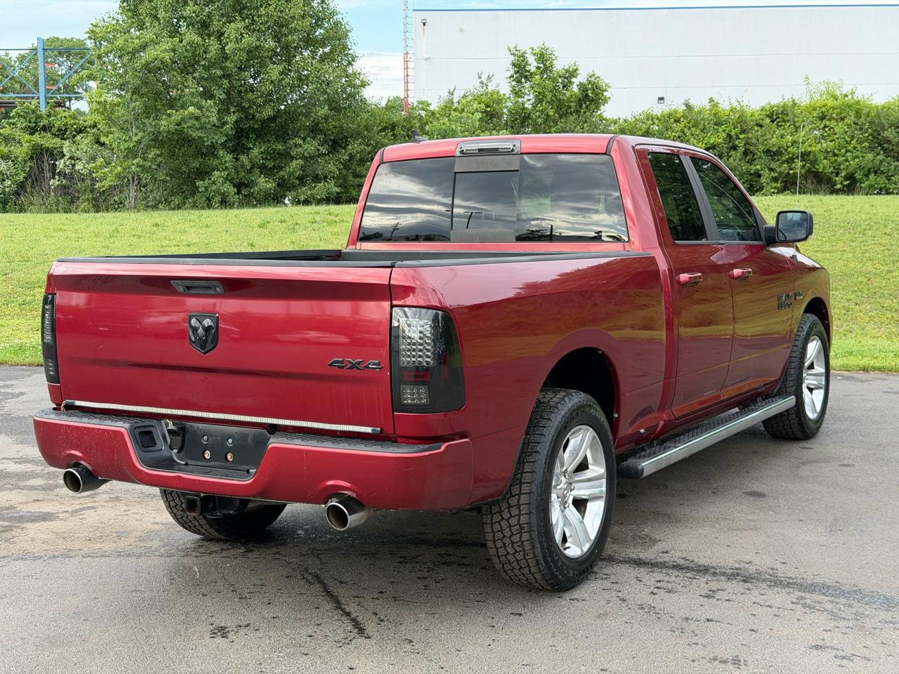 RAM 1500 4WD Quad Cab 140.5" Sport 2014