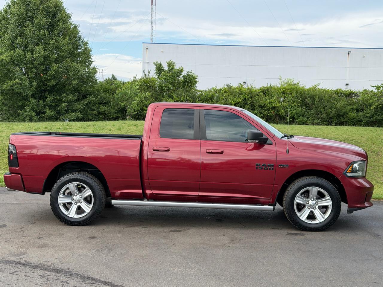RAM 1500 4WD Quad Cab 140.5" Sport 2014