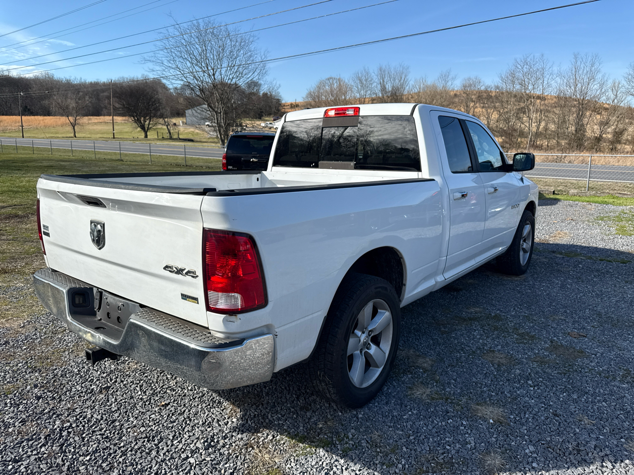 RAM 1500 4WD Quad Cab 140.5" SLT 2013