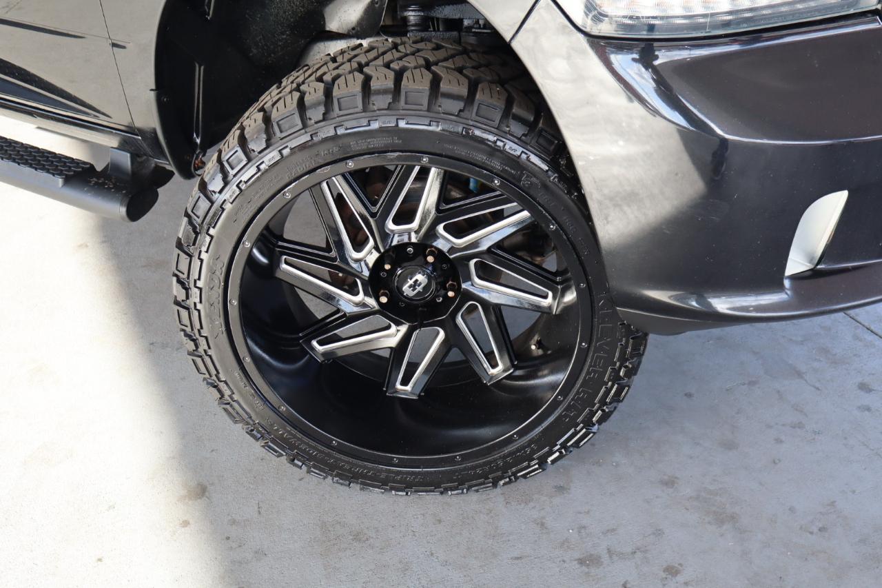 RAM 1500 4WD Quad Cab 140.5" Sport 2016