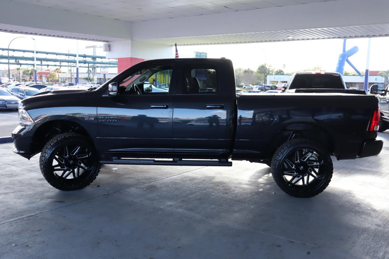 RAM 1500 4WD Quad Cab 140.5" Sport 2016